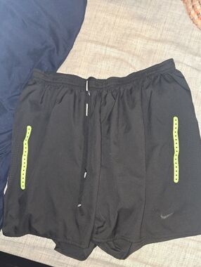 Nike Men’s Black Athletic Shorts with Neon Green Accent Strips